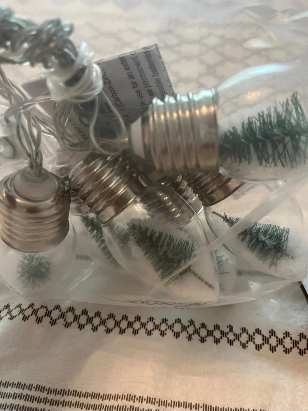 Christmas string light with small trees